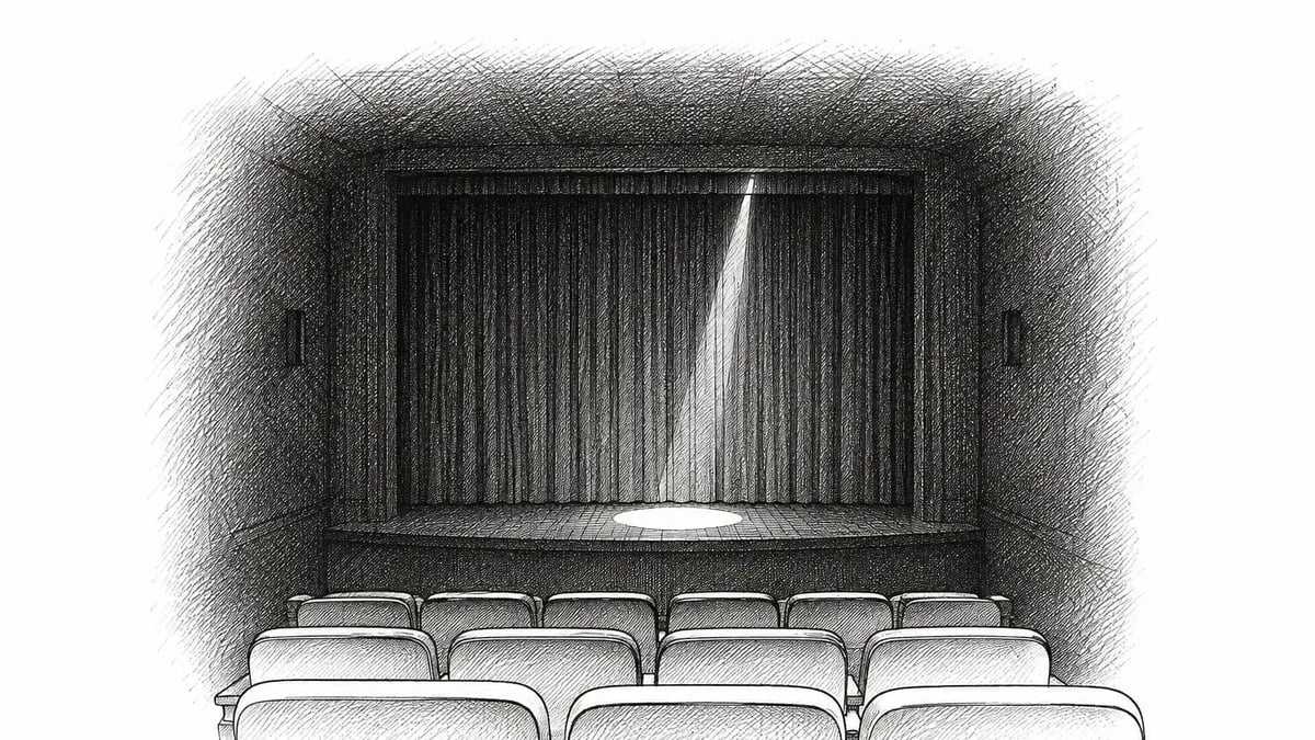 Dessin noir et blanc d’une salle de théâtre plongée dans le noir, un faisceau de lumière sur la scène — l’anxiété du soir